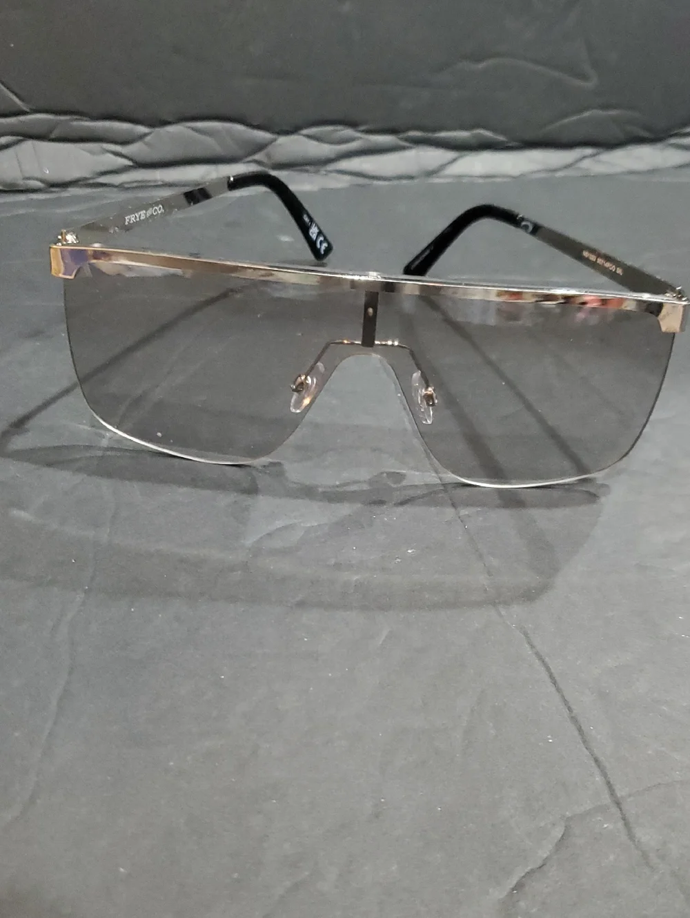 Frye silver flatbrow rimless frame oversized clear lenses square sunglasses